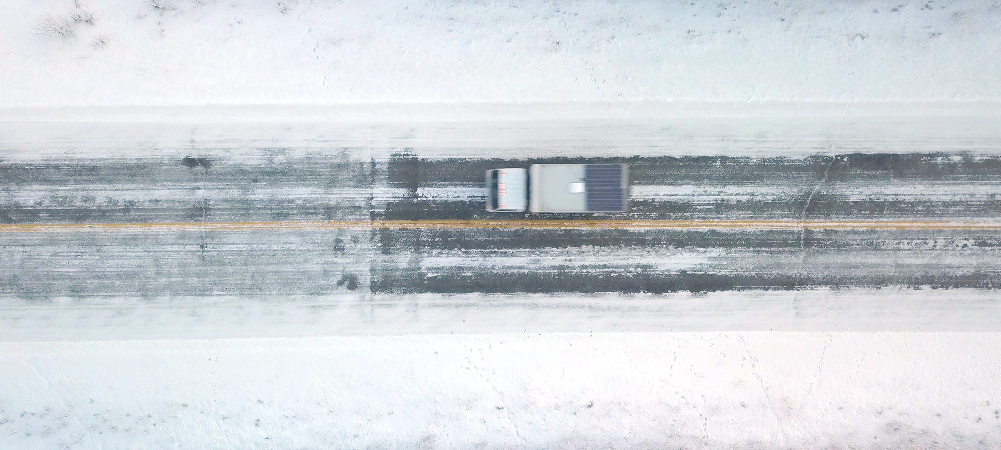 Overland vehicle through the arctic snow.